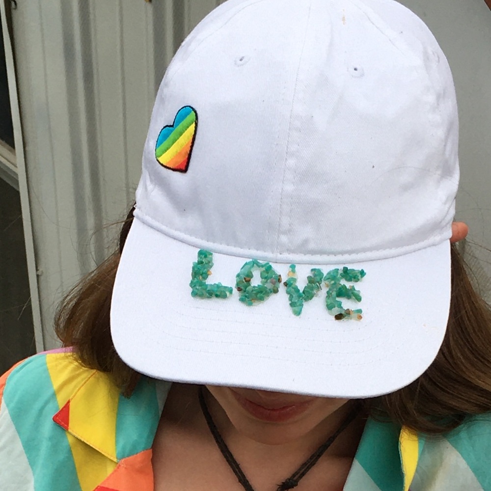 Self made Pride hat made with patches and crystals